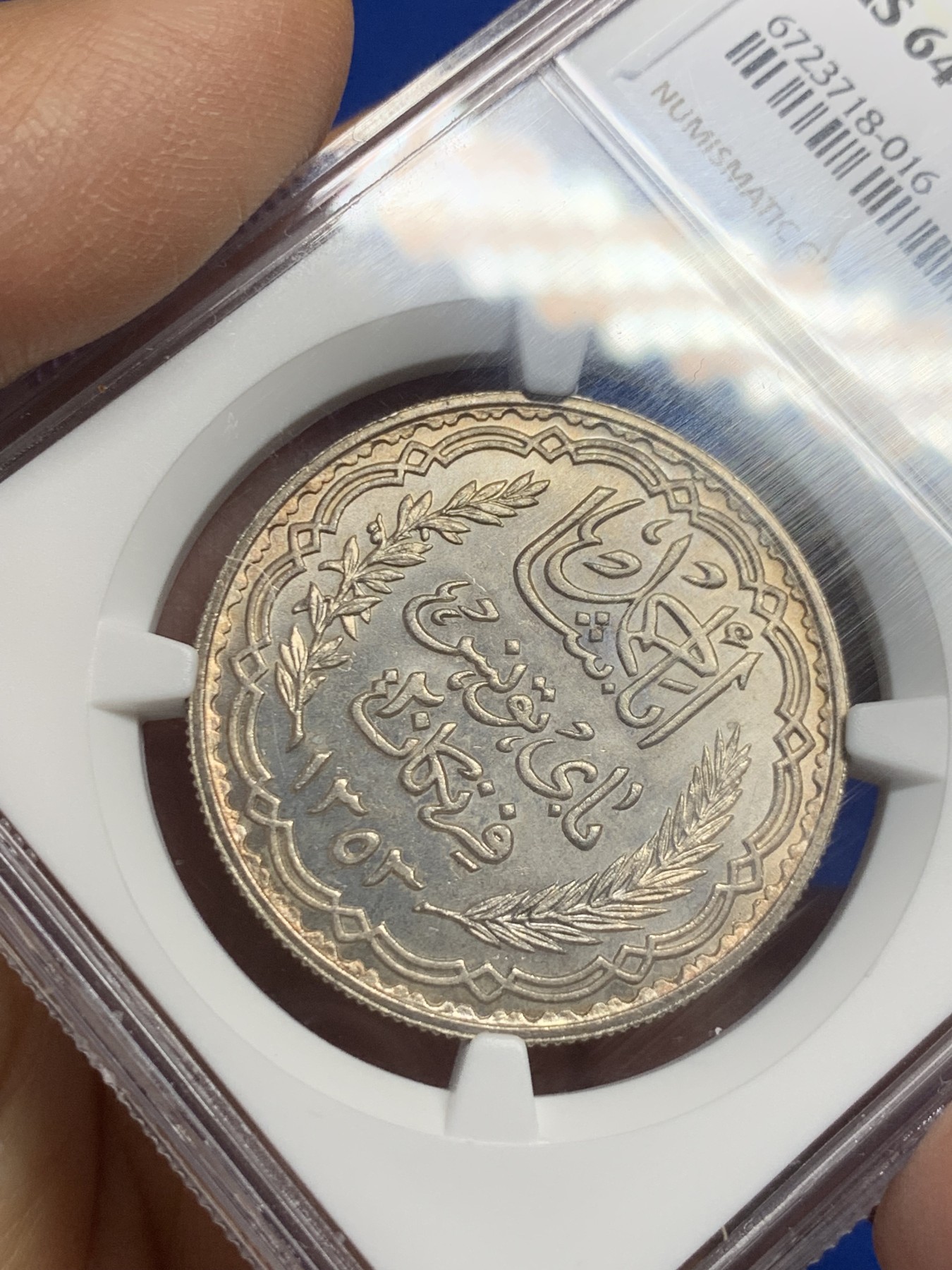 《竞宝斋》第235场-周日，周一，周二，周三 疯狂4连拍 (全场包邮) NGC-MS64 法属突尼斯1934年20法郎银币，突尼斯艾哈迈德二世时期流通的银主币。原汁原味老包浆，包浆醇厚，打制精美，状态一流，高分精品，获得更高评分数目才11枚。