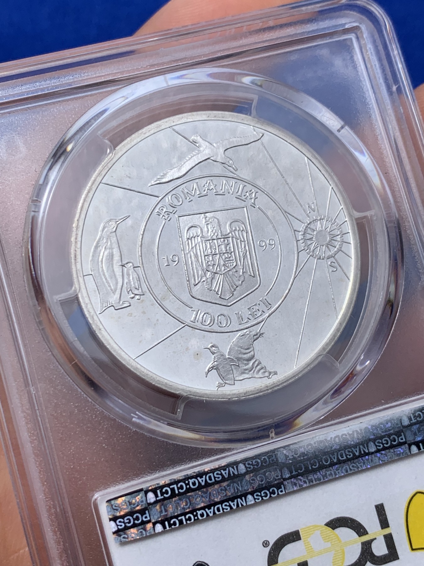 《竞宝斋》第235场-周日，周一，周二，周三 疯狂4连拍 (全场包邮) PCGS金盾 PR67DCAM 罗马尼亚1999年比利时号极地探险百年纪念100列伊精制大银币，亚军分