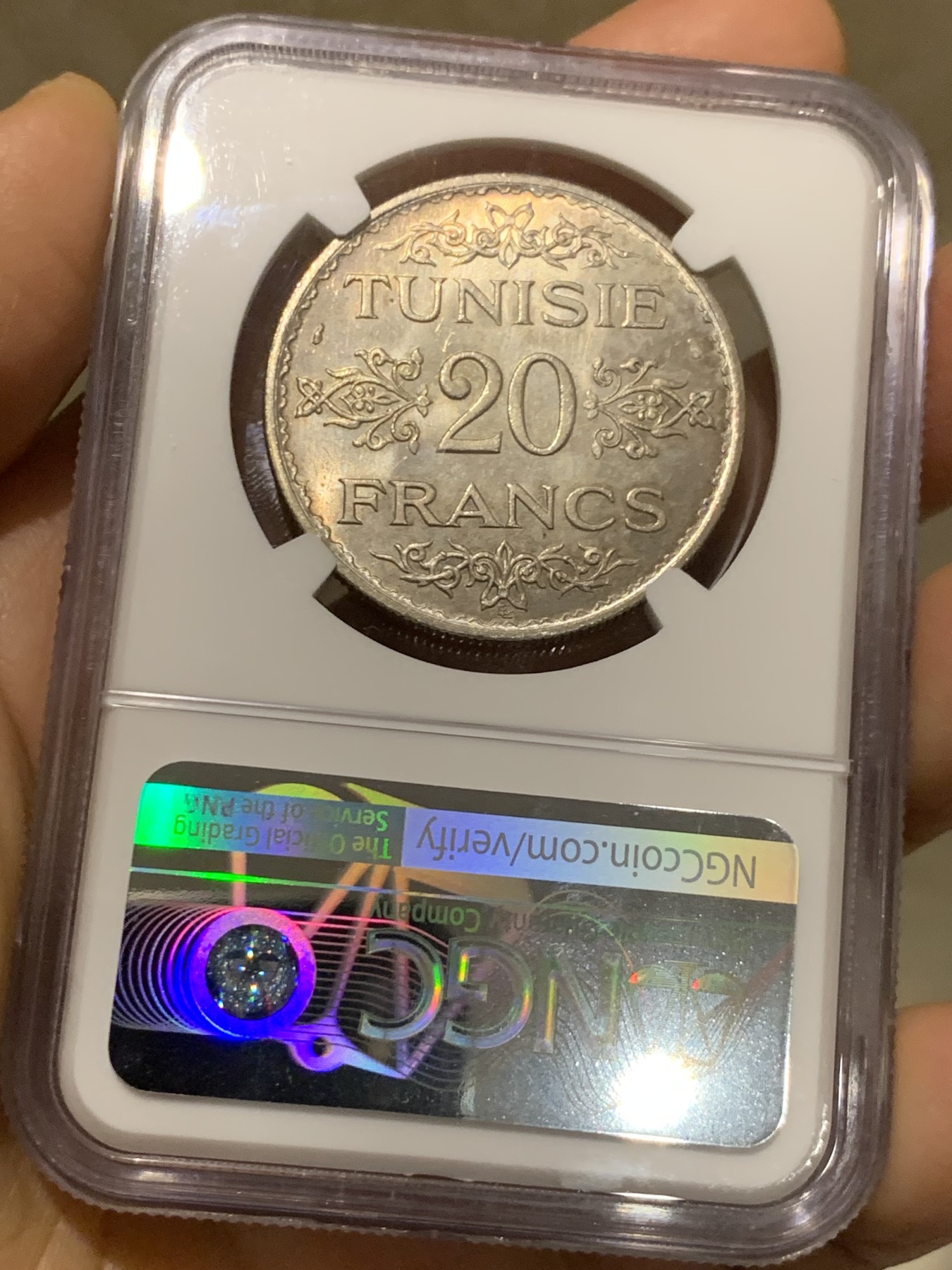 《竞宝斋》第235场-周日，周一，周二，周三 疯狂4连拍 (全场包邮) NGC-MS64 法属突尼斯1934年20法郎银币，突尼斯艾哈迈德二世时期流通的银主币。原汁原味老包浆，包浆醇厚，打制精美，状态一流，高分精品，获得更高评分数目才11枚。