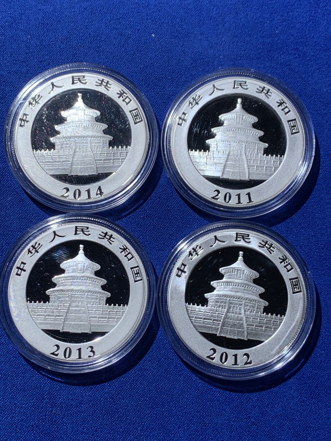 《竞宝斋》第235场-周日，周一，周二，周三 疯狂4连拍 (全场包邮) 2011-2014熊猫银币各一枚，共计四枚，有三张证书，三个银币盒子