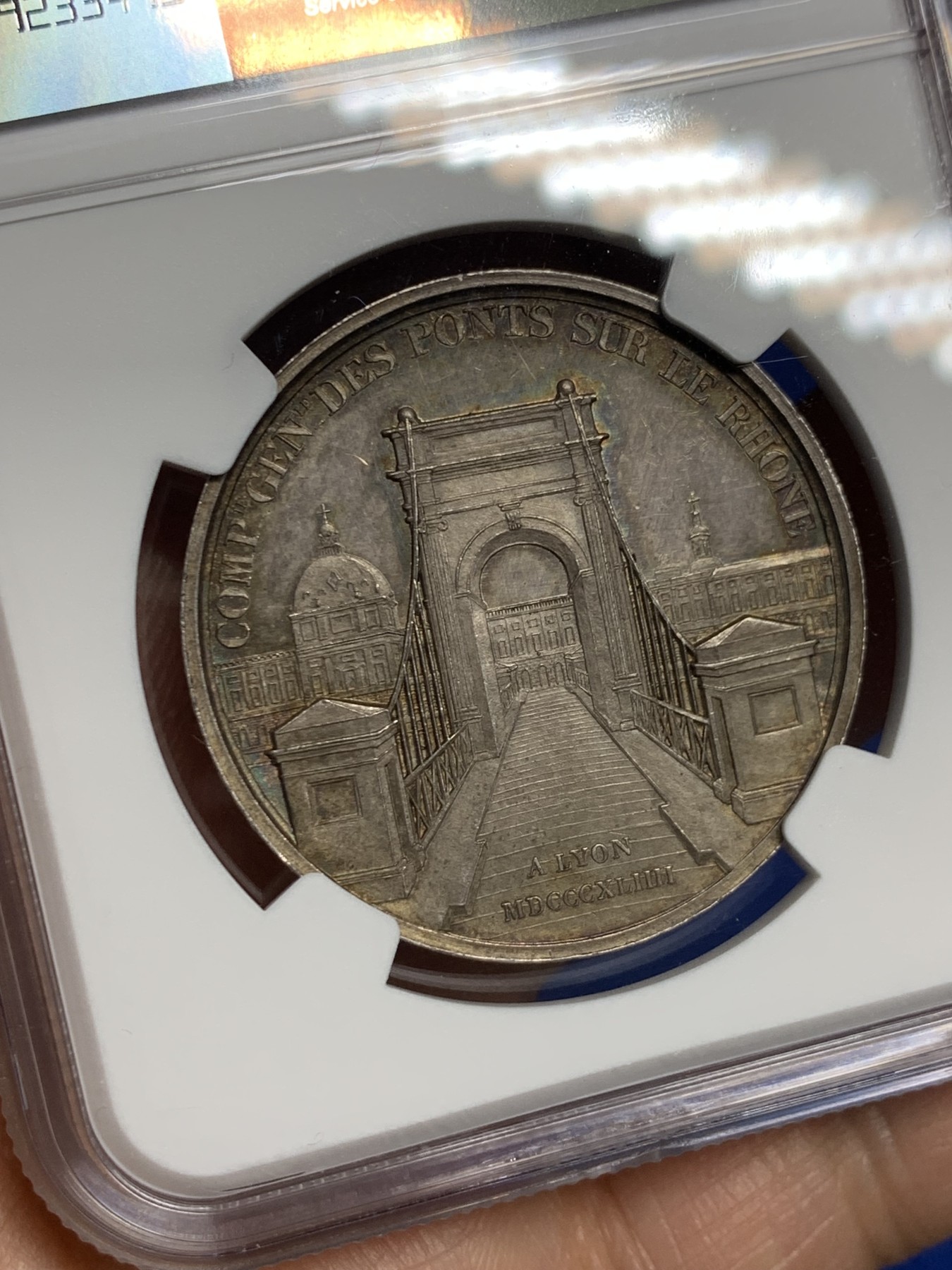 《竞宝斋》第237场- 周日，周一，周二，周日 疯狂4连拍 (全场包邮) NGC-MS63 法国银质代币，里昂罗纳河谷桥梁总公司，受罗纳河河神庇护的里昂大学院门户桥梁，1842-1845年船首边铭，五彩油性包浆