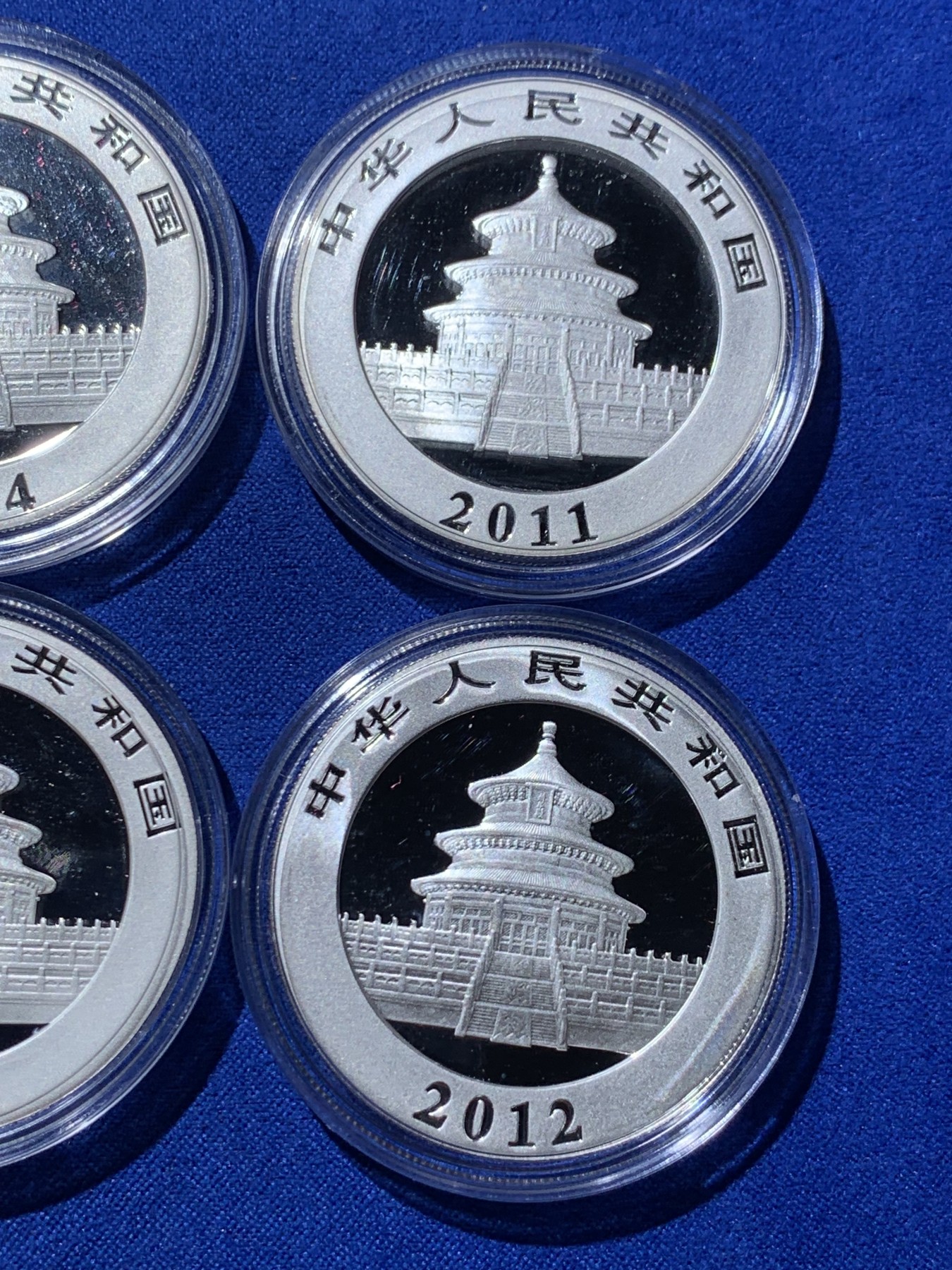 《竞宝斋》第235场-周日，周一，周二，周三 疯狂4连拍 (全场包邮) 2011-2014熊猫银币各一枚，共计四枚，有三张证书，三个银币盒子