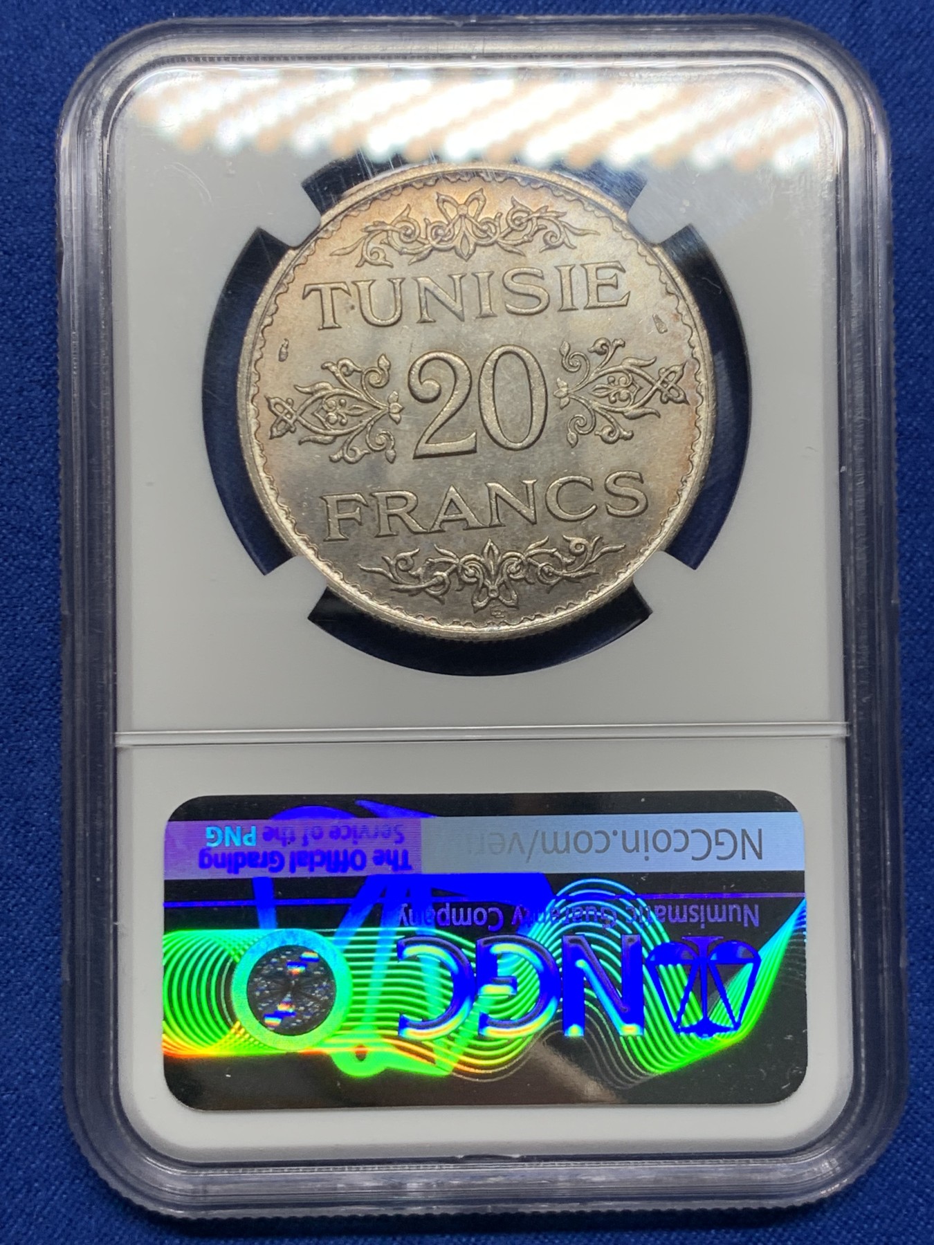 《竞宝斋》第235场-周日，周一，周二，周三 疯狂4连拍 (全场包邮) NGC-MS64 法属突尼斯1934年20法郎银币，突尼斯艾哈迈德二世时期流通的银主币。原汁原味老包浆，包浆醇厚，打制精美，状态一流，高分精品，获得更高评分数目才11枚。