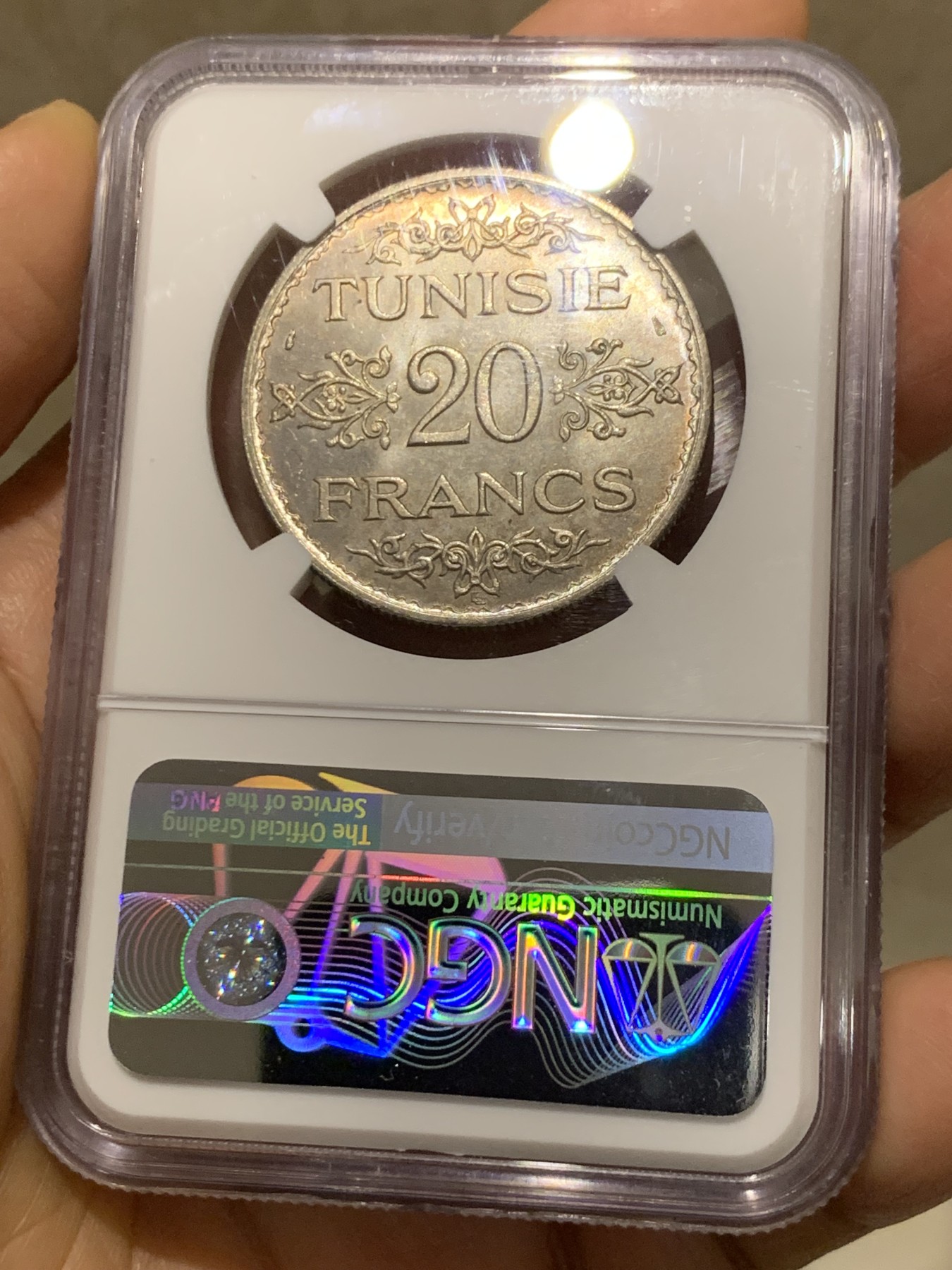 《竞宝斋》第235场-周日，周一，周二，周三 疯狂4连拍 (全场包邮) NGC-MS64 法属突尼斯1934年20法郎银币，突尼斯艾哈迈德二世时期流通的银主币。原汁原味老包浆，包浆醇厚，打制精美，状态一流，高分精品，获得更高评分数目才11枚。