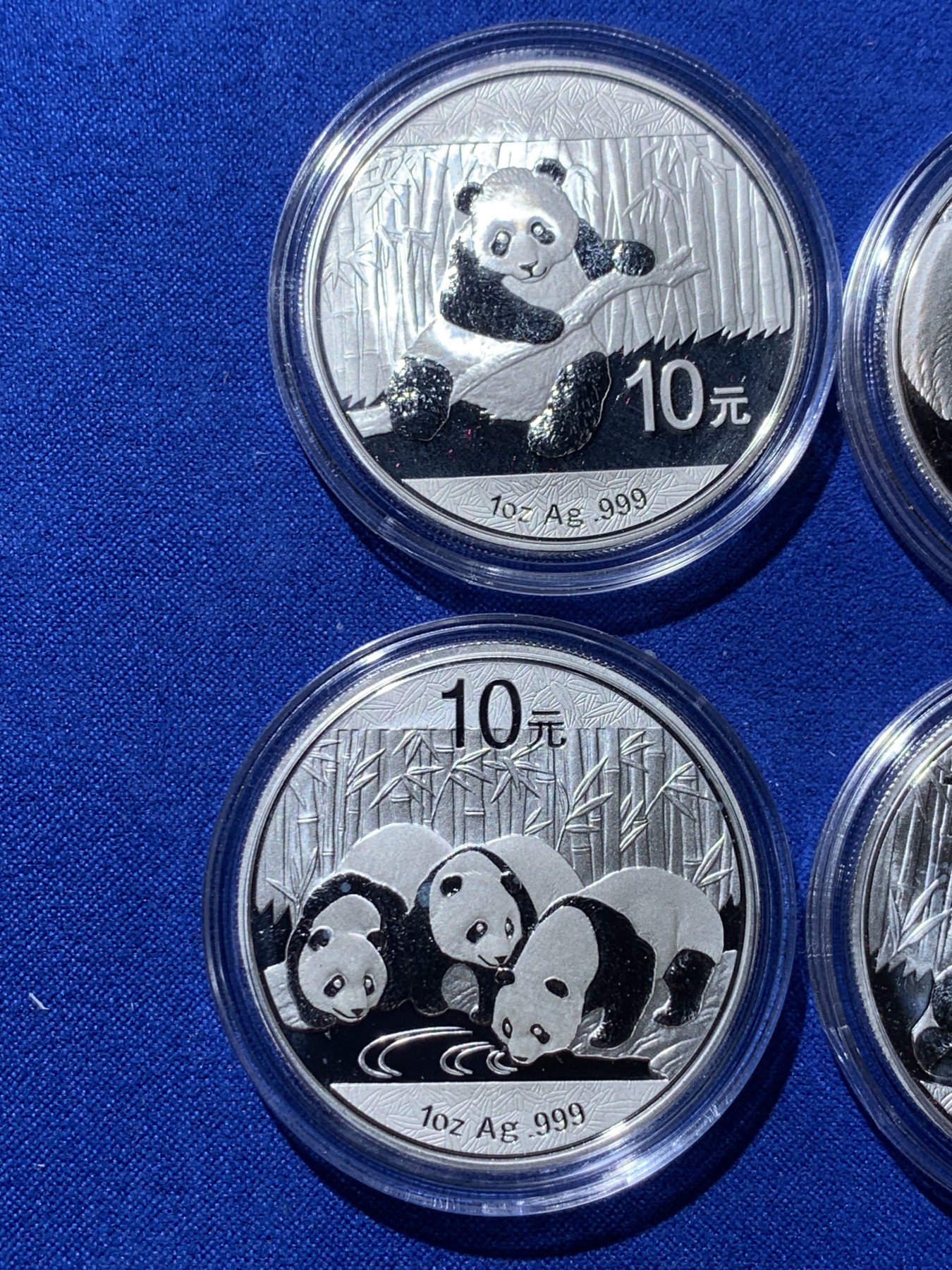 《竞宝斋》第235场-周日，周一，周二，周三 疯狂4连拍 (全场包邮) 2011-2014熊猫银币各一枚，共计四枚，有三张证书，三个银币盒子