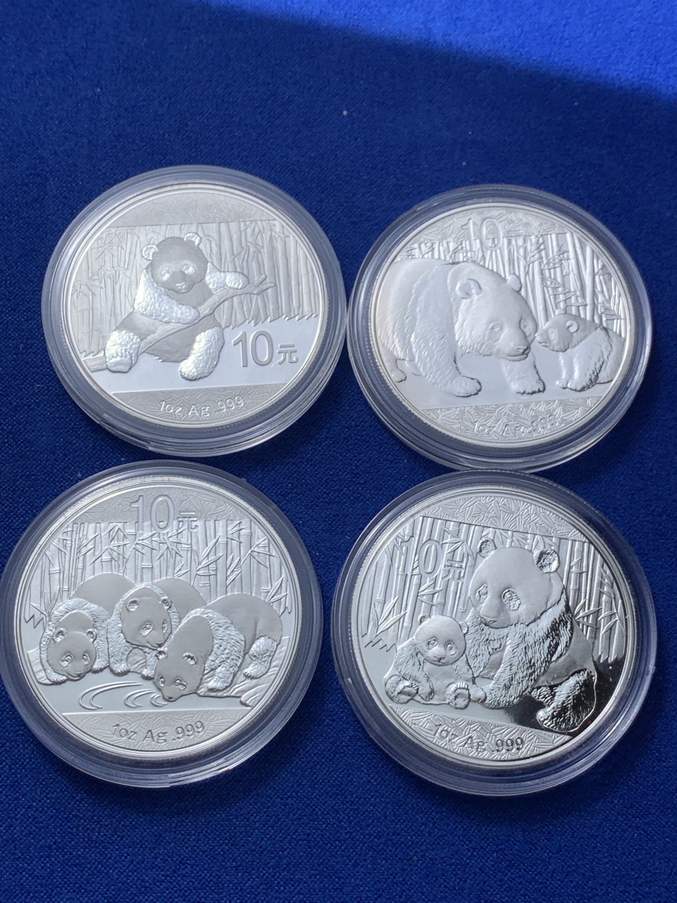 《竞宝斋》第235场-周日，周一，周二，周三 疯狂4连拍 (全场包邮) 2011-2014熊猫银币各一枚，共计四枚，有三张证书，三个银币盒子