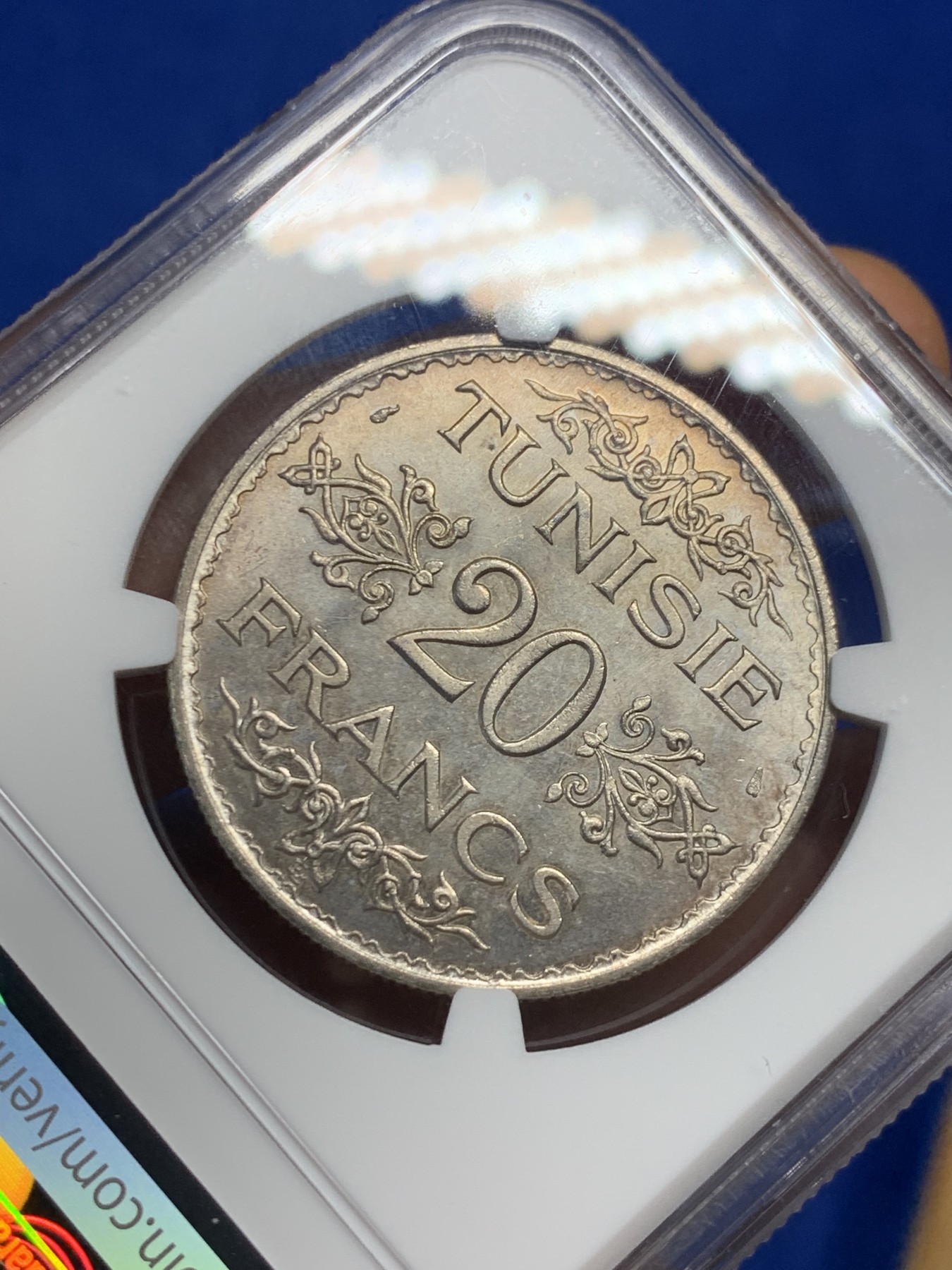 《竞宝斋》第235场-周日，周一，周二，周三 疯狂4连拍 (全场包邮) NGC-MS64 法属突尼斯1934年20法郎银币，突尼斯艾哈迈德二世时期流通的银主币。原汁原味老包浆，包浆醇厚，打制精美，状态一流，高分精品，获得更高评分数目才11枚。