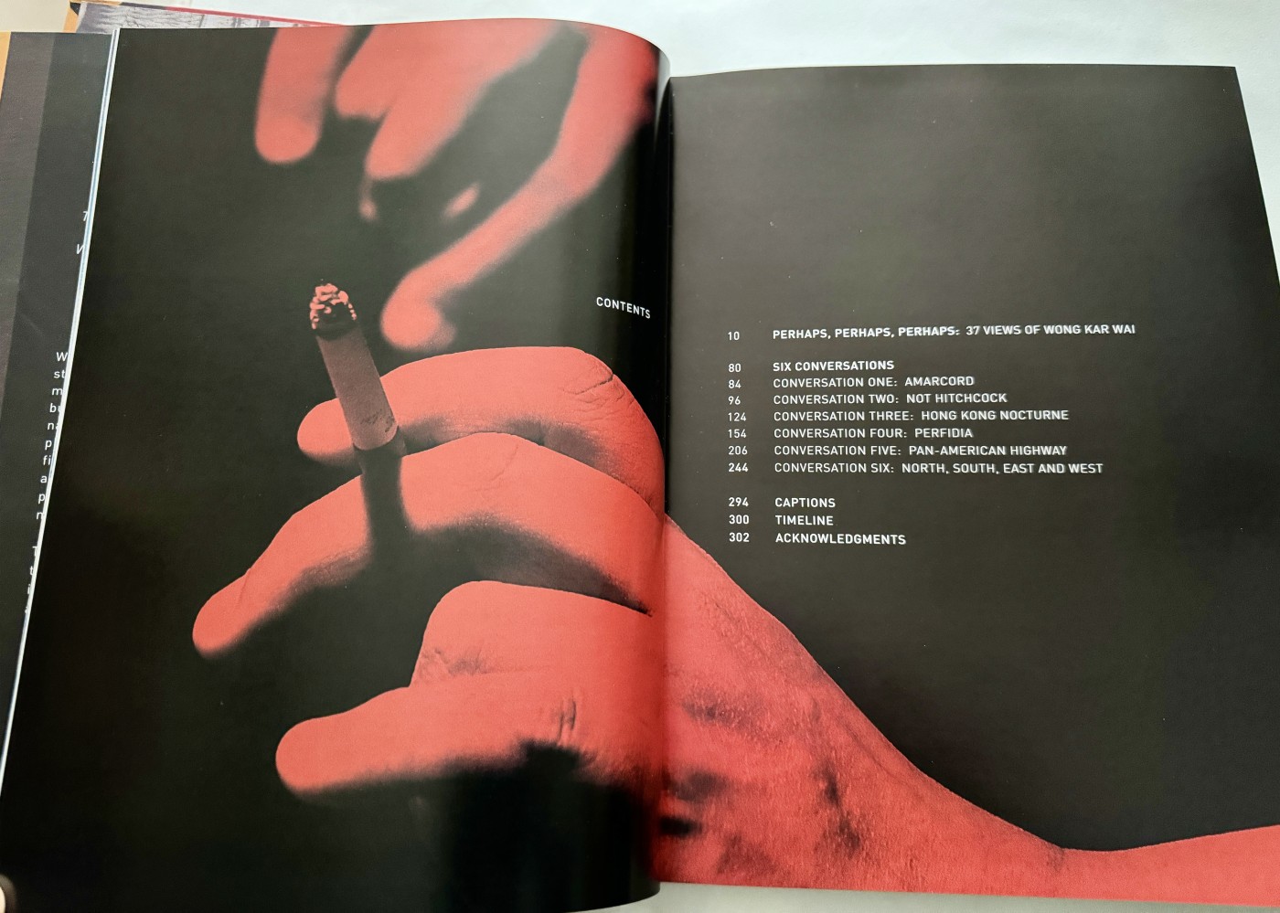 零元拍：王家卫导演亲笔签名英文版影像集«WKW: The Cinema of Wong Kar Wai» 。