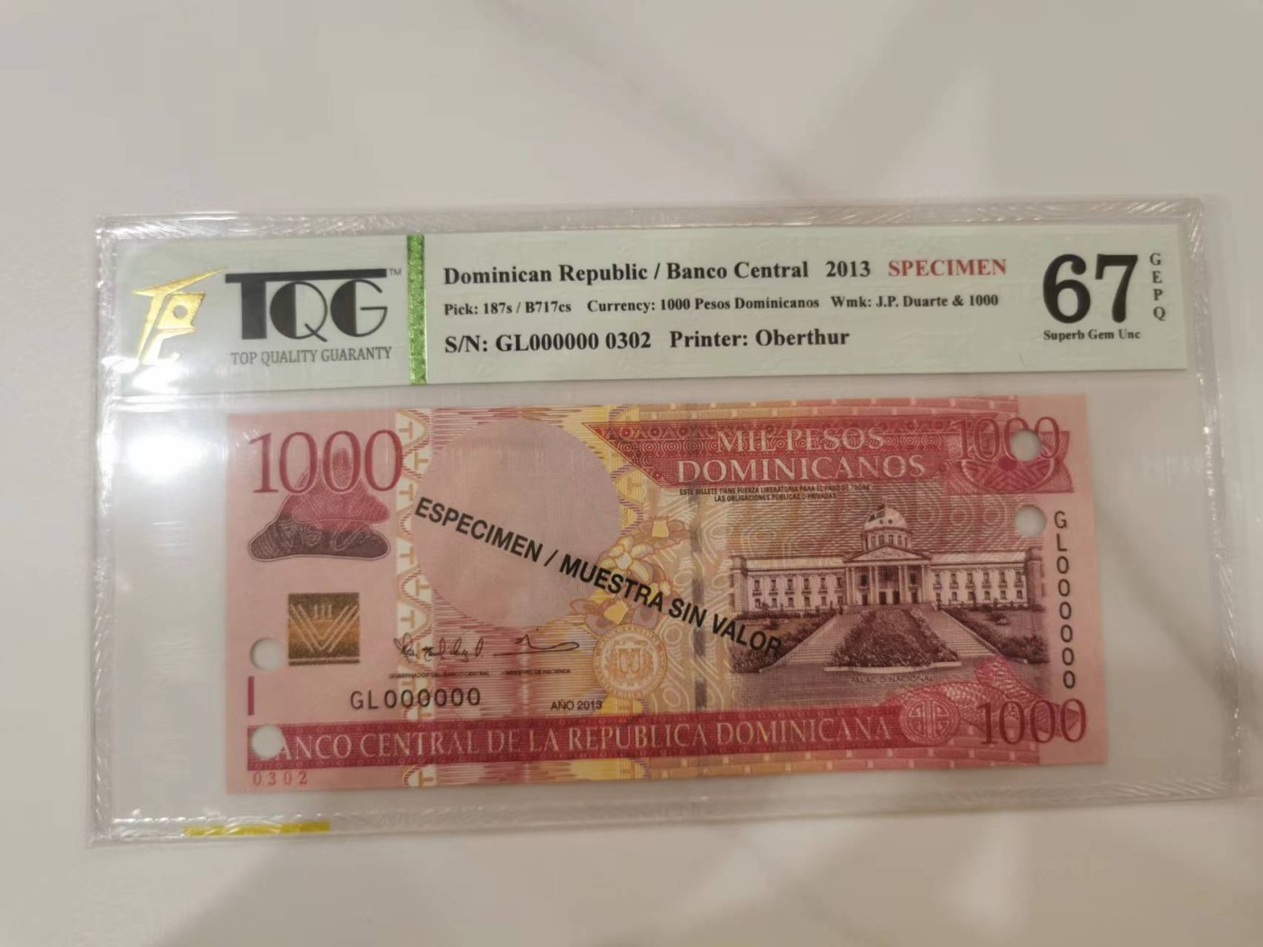 258.【鲸贝乐淘★两拍包邮】弟子规·第“物虽小，勿私藏。苟私藏，亲心伤。”号拍卖 【多米尼加共和国🇩🇴★全零票样编号0302】2013年1000比索，TQG67G