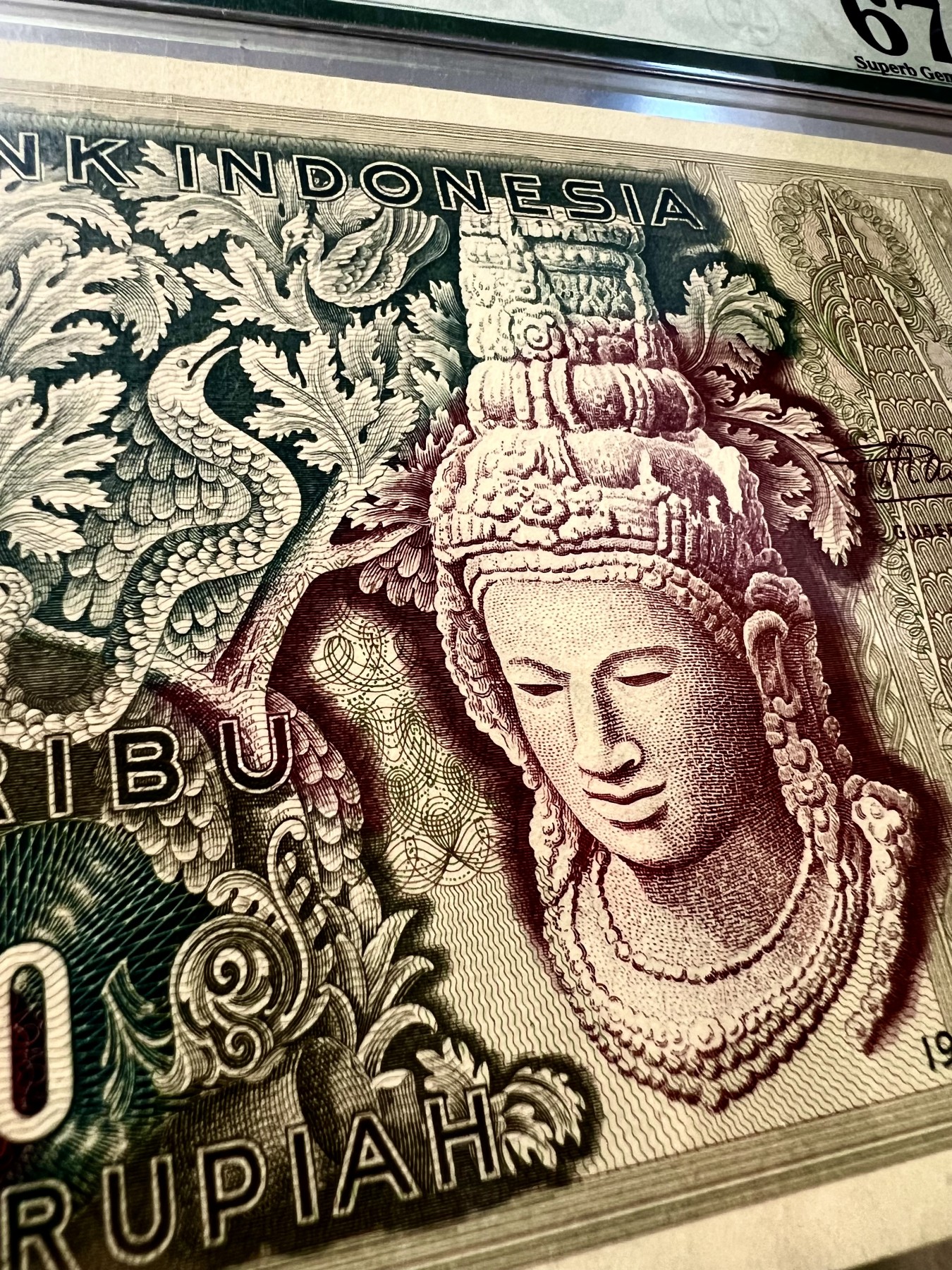 【Blue Auction】✨世界纸币精拍第425期【精】   【冠军分仅3张 非补号版更稀少 名家旧藏】印尼 1952年1000卢比 最高值 PMG67EPQ超高分 该顶级分数国外各大拍卖也鲜有出现 值得收藏 世界遗产婆罗浮屠是9世纪当时世上最大型的佛教建筑物，2012年6月底，被吉尼斯确认为当今世界上最大的佛寺，与中国的长城、印度的泰姬陵、柬埔寨的吴哥窟并称为古代东方四大奇迹。