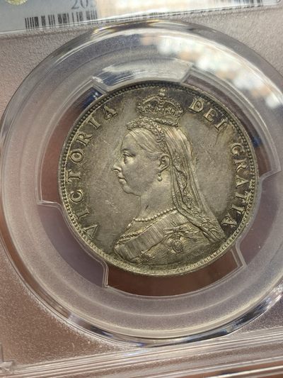 《竞宝斋》第239场-周日，周一 年终拍场 (全场包邮) NGC MS62 英国1887年维多利亚1佛洛林银币 传世五彩包浆 低评 值得入手