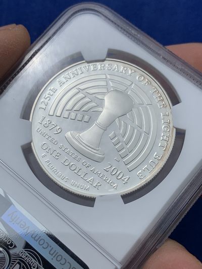 《竞宝斋》第239场-周日，周一 年终拍场 (全场包邮) NGC PF69 美国2004年爱迪生发明电灯125周年精致纪念银币 06年克劳斯最具历史意义币