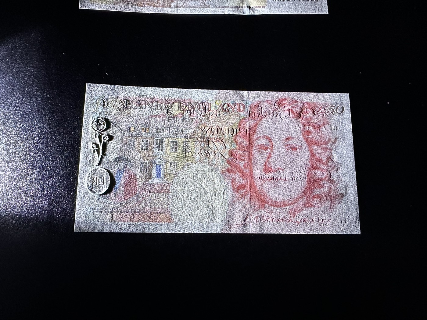 《外钞收藏家》第三百三十六期 1994年英国E序列50镑 全新 有个潮点瑕疵