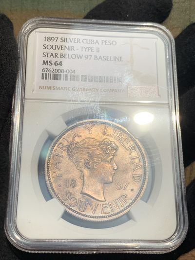 《竞宝斋》第239场-周日，周一 年终拍场 (全场包邮) NGC  MS64 古巴 1897年 女神 1比索银币 双面深彩包浆 1897年古巴独立爱国者在纽约制作的第一枚纪念银币 第一次在钱币上出现古巴盾徽图案 具有非凡意义 热门品种