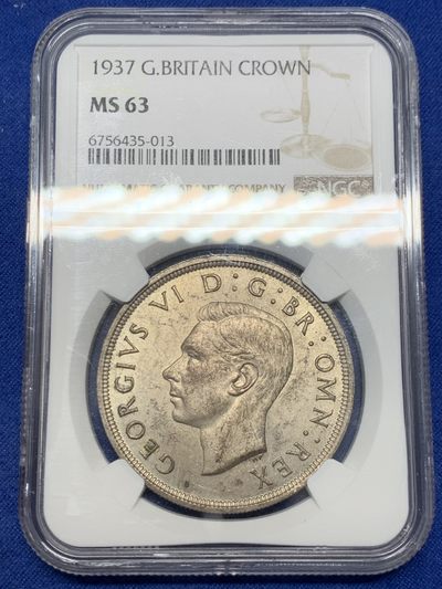 《竞宝斋》第239场-周日，周一 年终拍场 (全场包邮) NGC-MS63 1937年英国乔治六世登基1克朗纪念银币，原汁原味双面淡彩包浆，包浆醇厚，打制精美，状态非常好。