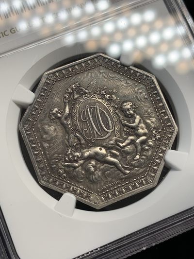 《竞宝斋》第239场-周日，周一 年终拍场 (全场包邮) NGC MS61 法国八角银质代币，皇家婚姻，小名誉品三个小天使，状态非常好，黑色包浆难得