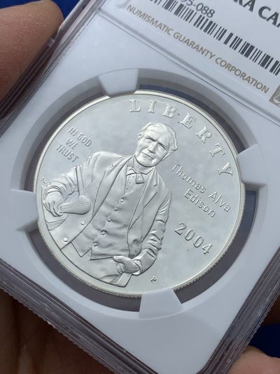 《竞宝斋》第239场-周日，周一 年终拍场 (全场包邮) NGC PF69 美国2004年爱迪生发明电灯125周年精致纪念银币 06年克劳斯最具历史意义币