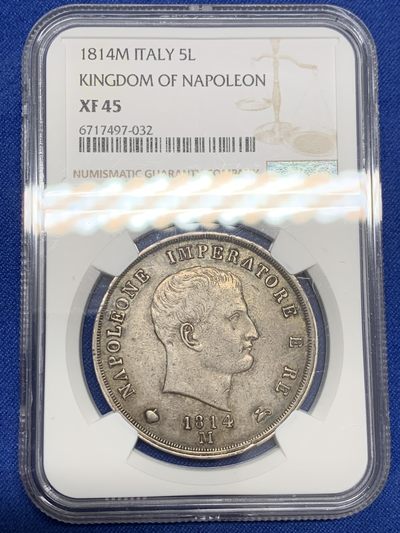 《竞宝斋》第239场-周日，周一 年终拍场 (全场包邮) NGC XF45 1814M法国占领意大利王国拿破仑一世5里拉银币，实物细节很好，深打制发丝盾徽清晰，老黑彩包浆，AU的状态。1814为关门年份，仅有M厂米兰铸造，数量仅10万，为战争期间好品罕见，此年拿破仑战败被流放，很有历史意义。