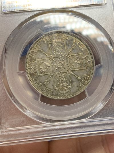 《竞宝斋》第239场-周日，周一 年终拍场 (全场包邮) NGC MS62 英国1887年维多利亚1佛洛林银币 传世五彩包浆 低评 值得入手