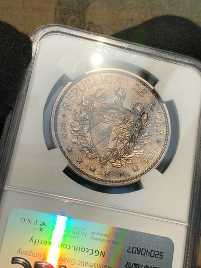 《竞宝斋》第239场-周日，周一 年终拍场 (全场包邮) NGC  MS64 古巴 1897年 女神 1比索银币 双面深彩包浆 1897年古巴独立爱国者在纽约制作的第一枚纪念银币 第一次在钱币上出现古巴盾徽图案 具有非凡意义 热门品种