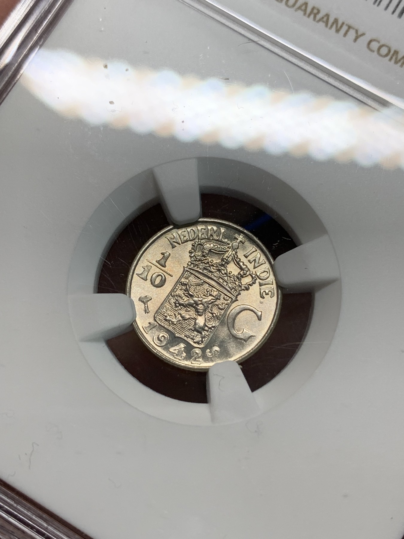 《竞宝斋》第240场-周日，周一 年终尾场 (全场包邮) NGC MS66 1942年S版 荷属东印度群岛（今印尼）1/10盾 银币