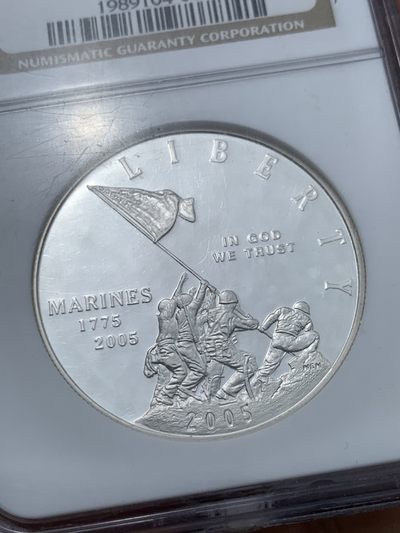 《竞宝斋》第239场-周日，周一 年终拍场 (全场包邮) NGC-PF69UC  美国海军陆战队成立230年纪念精制1美元银币。