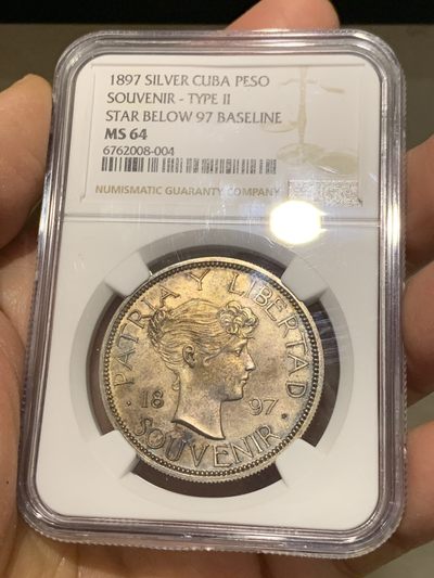 《竞宝斋》第239场-周日，周一 年终拍场 (全场包邮) NGC  MS64 古巴 1897年 女神 1比索银币 双面深彩包浆 1897年古巴独立爱国者在纽约制作的第一枚纪念银币 第一次在钱币上出现古巴盾徽图案 具有非凡意义 热门品种