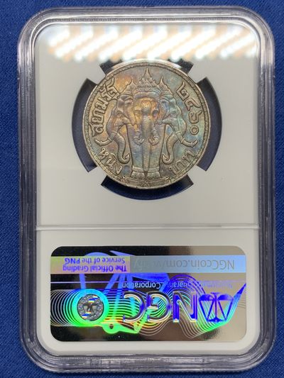 《竞宝斋》第239场-周日，周一 年终拍场 (全场包邮) NGC-AU58 1917年泰国拉玛六世1泰铢银币，拉玛六世（1910-1925年在位）面值1泰铢泰国大象银币，原汁原味极美五彩老包浆，包浆醇厚，状态极佳。严重低评，状态和品质绝对不输MS级。