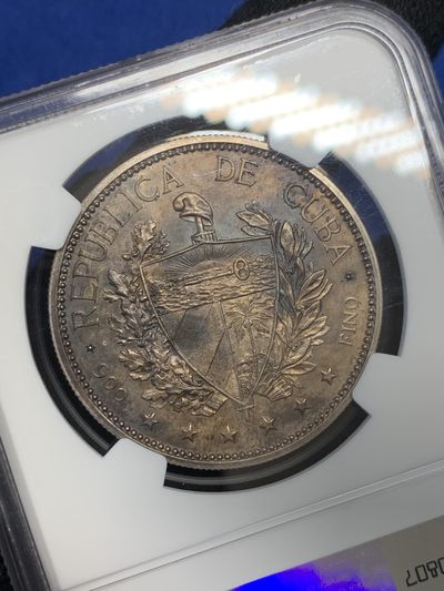 《竞宝斋》第239场-周日，周一 年终拍场 (全场包邮) NGC  MS64 古巴 1897年 女神 1比索银币 双面深彩包浆 1897年古巴独立爱国者在纽约制作的第一枚纪念银币 第一次在钱币上出现古巴盾徽图案 具有非凡意义 热门品种