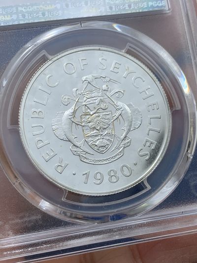 《竞宝斋》第239场-周日，周一 年终拍场 (全场包邮) PCGS-PR68 塞舌尔1980年国际儿童年50卢比精制纪念银币，925银，发行量1万枚。PROOF精制币，镜面状态，获得更高评级数量6枚。