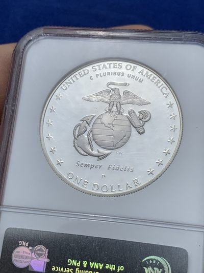 《竞宝斋》第239场-周日，周一 年终拍场 (全场包邮) NGC-PF69UC  美国海军陆战队成立230年纪念精制1美元银币。