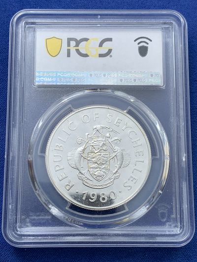 《竞宝斋》第239场-周日，周一 年终拍场 (全场包邮) PCGS-PR68 塞舌尔1980年国际儿童年50卢比精制纪念银币，925银，发行量1万枚。PROOF精制币，镜面状态，获得更高评级数量6枚。