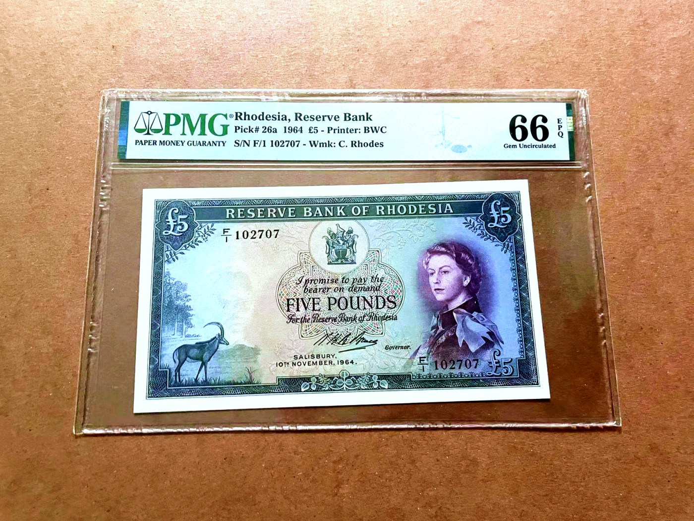 【Blue Auction】✨世界纸币精拍第429期——苍老师专场 PART2  【首发冠】罗德西亚 1964年5镑 PMG66EPQ BWC出品 戎装女王 大津巴布韦遗址 精美  