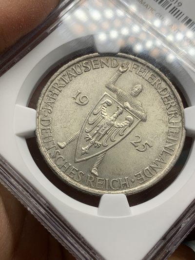 《竞宝斋》第239场-周日，周一 年终拍场 (全场包邮) NGC-MS63 1925年A版德国魏玛共和国莱茵千年5马克银币，原汁原味老包浆，包浆醇厚，状态极佳，获得更高的评分数目才76枚，潜力品种。