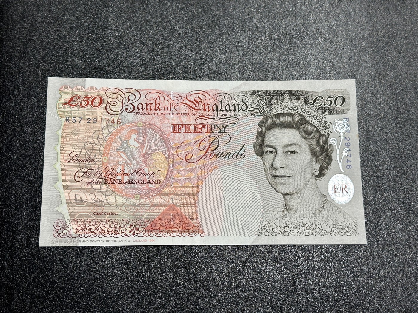 《外钞收藏家》第三百三十六期 1994年英国E序列50镑 全新 有个潮点瑕疵