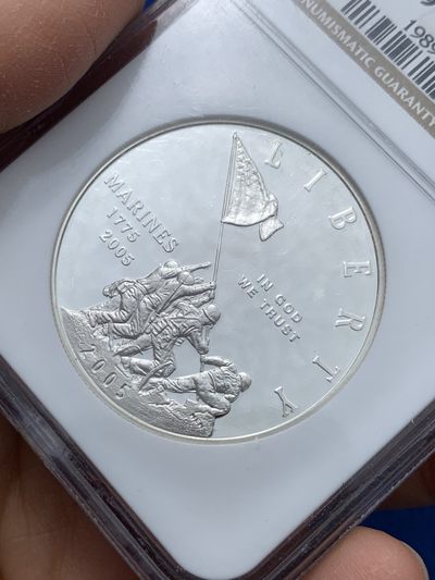 《竞宝斋》第239场-周日，周一 年终拍场 (全场包邮) NGC-PF69UC  美国海军陆战队成立230年纪念精制1美元银币。