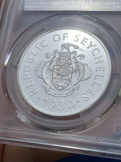 《竞宝斋》第239场-周日，周一 年终拍场 (全场包邮) PCGS-PR68 塞舌尔1980年国际儿童年50卢比精制纪念银币，925银，发行量1万枚。PROOF精制币，镜面状态，获得更高评级数量6枚。