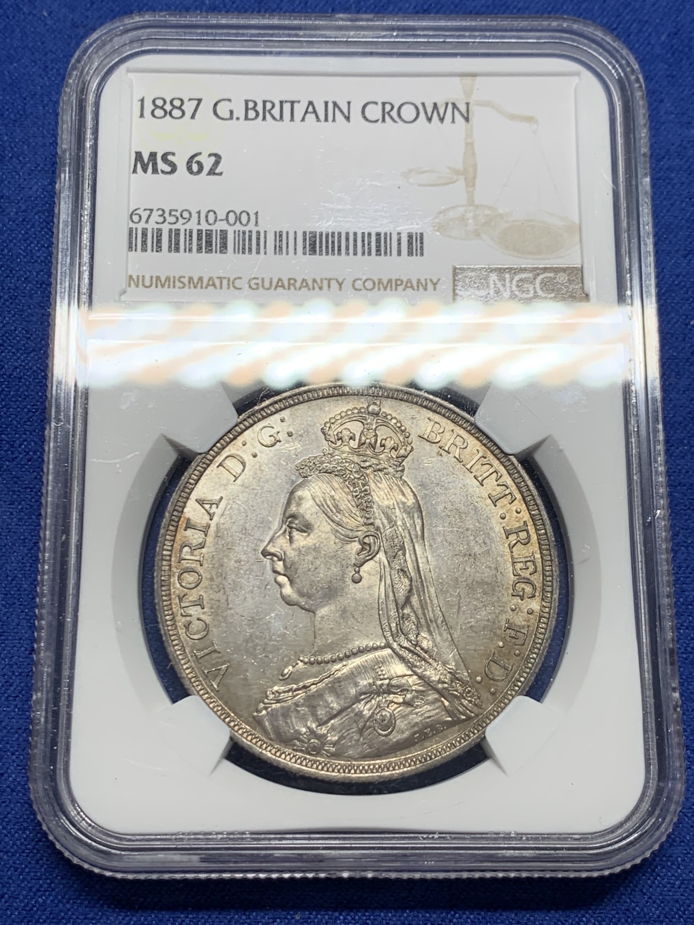 《竞宝斋》第240场-周日，周一 年终尾场 (全场包邮) NGC MS62 英国 1887年 1克朗 马剑银币 淡彩包浆 品相很不错