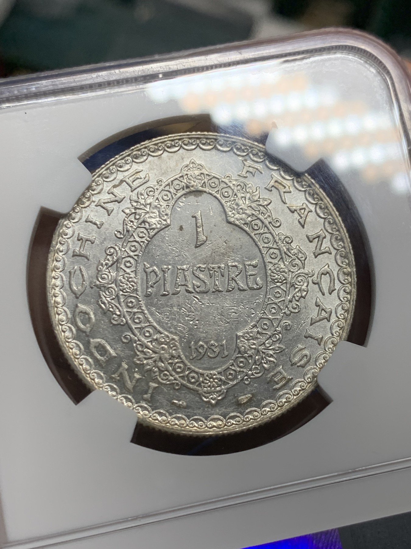 《竞宝斋》第240场-周日，周一 年终尾场 (全场包邮) NGC-UNCD 1931年法属印支“最后的坐洋”1皮阿斯特银币，币面清爽又干净，打制精美，包浆醇厚润泽又犀利，状态极佳。