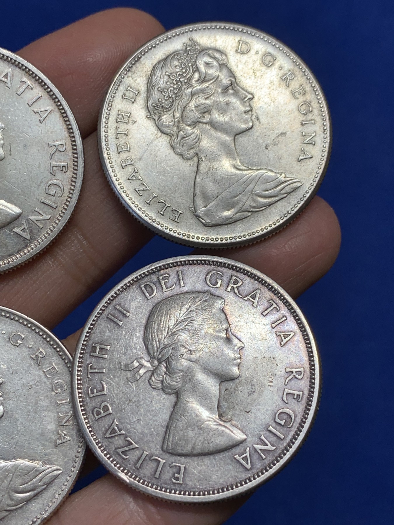 《竞宝斋》第240场-周日，周一 年终尾场 (全场包邮) 4枚一组 加拿大一元银币 每枚重23.3g 800银 状态都不错 带底光