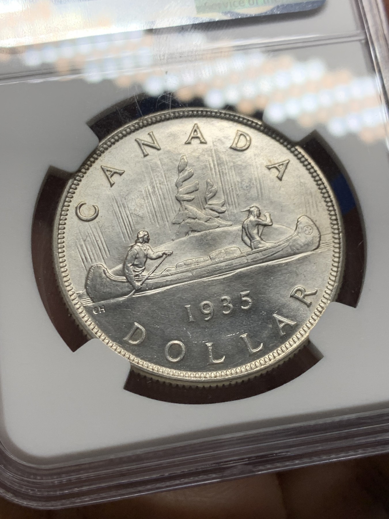 《竞宝斋》第240场-周日，周一 年终尾场 (全场包邮) NGC-MS64 加拿大 1935年1元 乔五划船银币 经典图案 银光闪闪 高分好品 一步到位