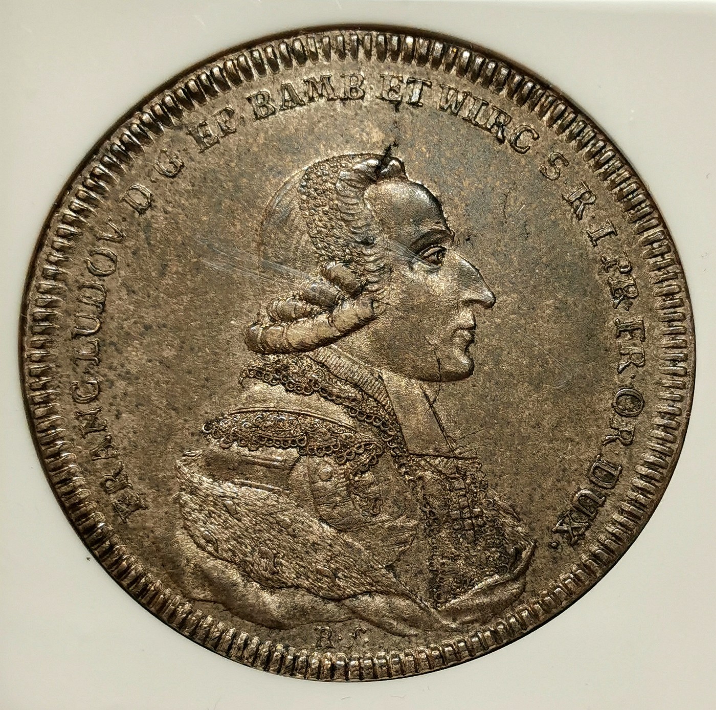 凡希社世界钱币微拍第二百六十期 荐！1794维尔茨堡采邑主教泰勒大银NGC-AU55，稀有品种，正面主教像刻画传神，背图小天使正向代表着知识的地球仪与书籍敬献花环，包浆淳熟味道极赞的一枚！