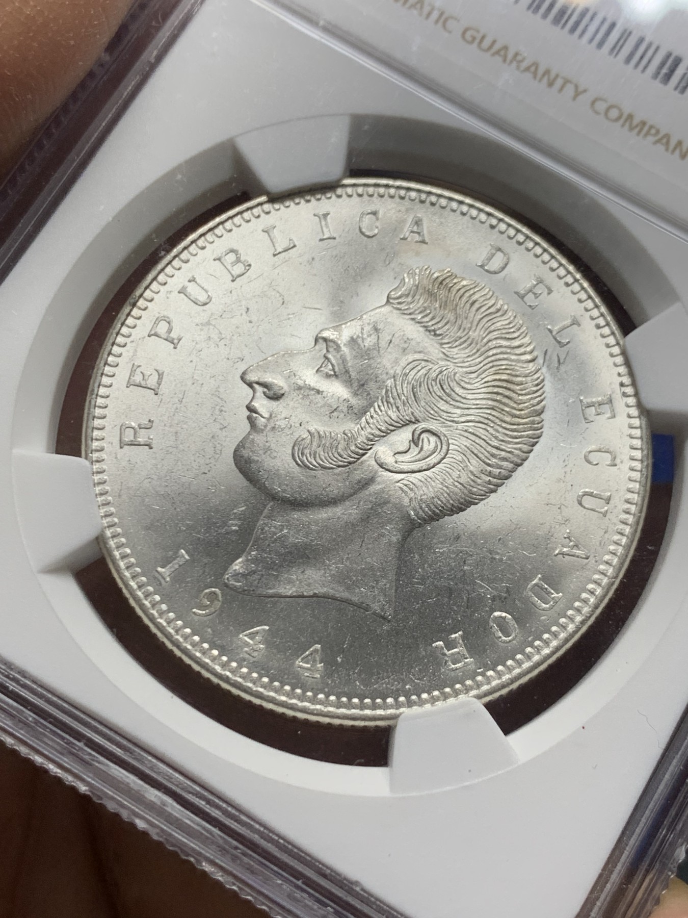 《竞宝斋》第240场-周日，周一 年终尾场 (全场包邮) NGC-MS63 厄瓜多尔 1944年5苏克雷银币 方便面头 卷拆爆光品相 闪闪发亮