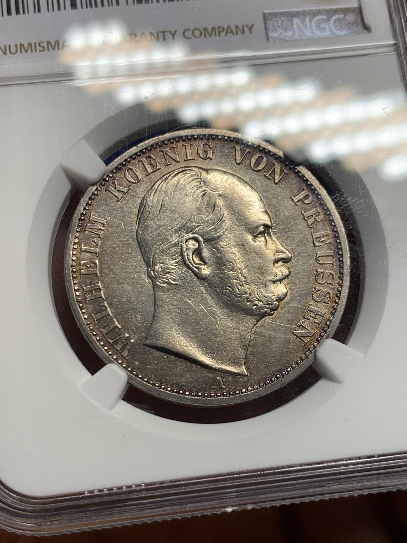 《竞宝斋》第240场-周日，周一 年终尾场 (全场包邮) NGC AUD 1866年德国普鲁士威廉一世1泰勒银币，包浆漂亮，品相很好