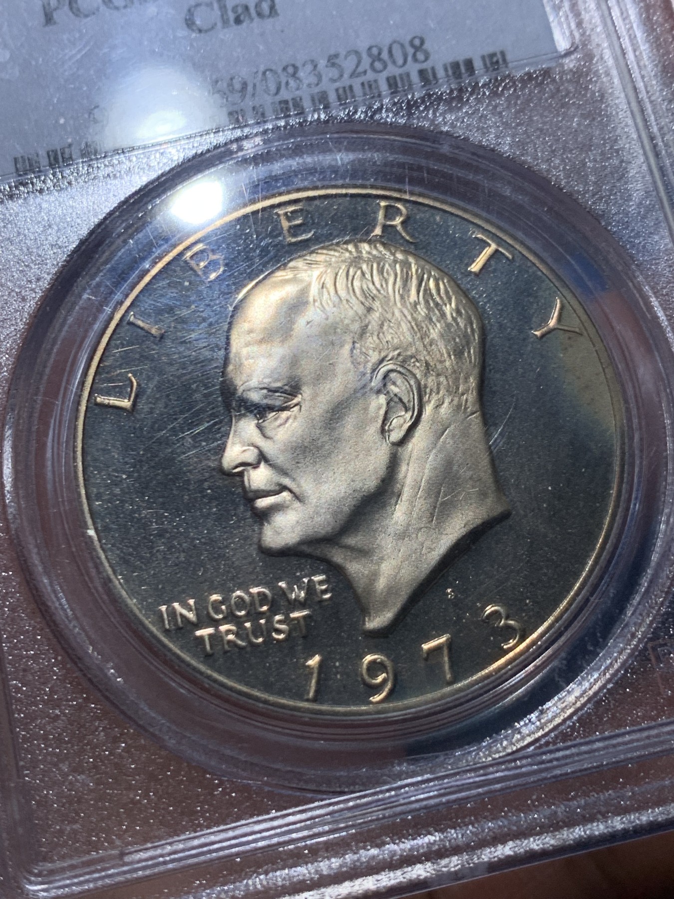 《竞宝斋》第240场-周日，周一 年终尾场 (全场包邮) PCGS-PR69DCAM 1973年美国艾森豪威尔1美元精制币，直径38mm，重22.8克，状态极佳，PC早期经典小白盒老盒无官网图，更高评级数量55枚。