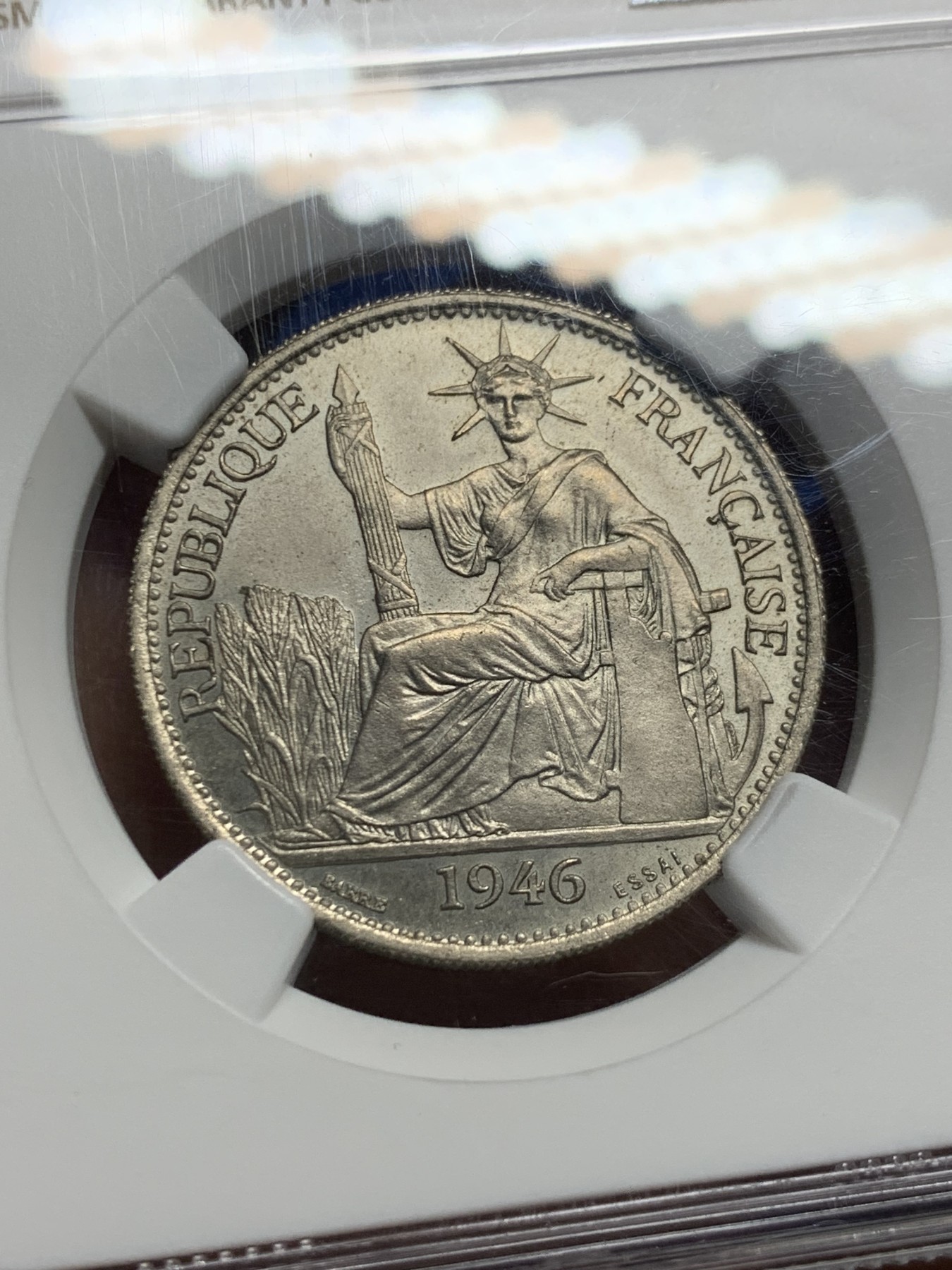 《竞宝斋》第240场-周日，周一 年终尾场 (全场包邮) NGC SP65 收藏级高分季军分 1946年法属印支坐洋50分镍质样币ESSAI签字版胜利女神，顶级品相，总发行量1100枚，属于座洋大珍名誉品。