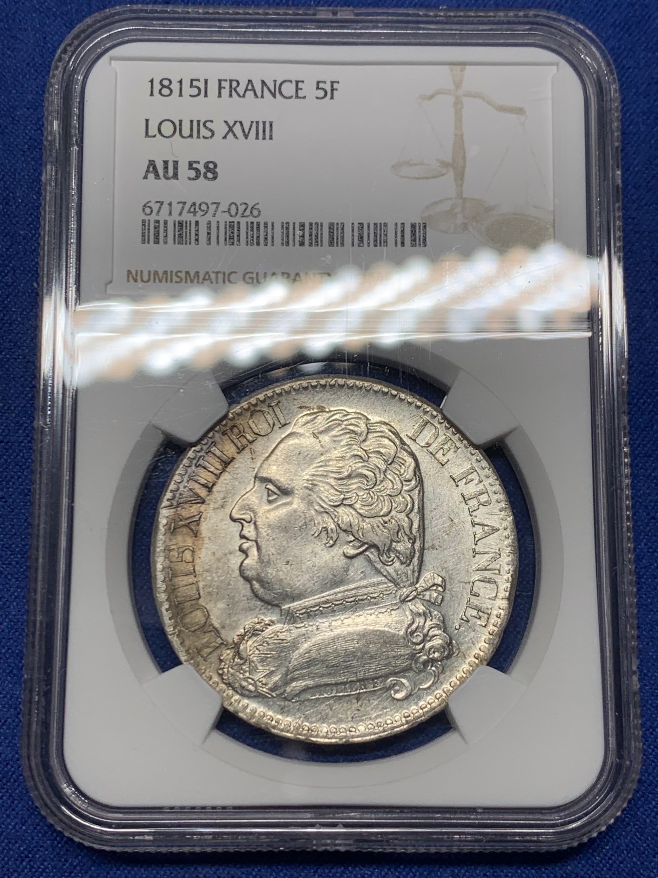 《竞宝斋》第240场-周日，周一 年终尾场 (全场包邮) NGC AU58 唯一冠军分 法国1815年路易十八戎装版5法郎银币，拿破仑百日王朝回归同年，为战争期间好品罕见，比常见1814更珍稀。I厂利摩日 银光细节状态都很难得