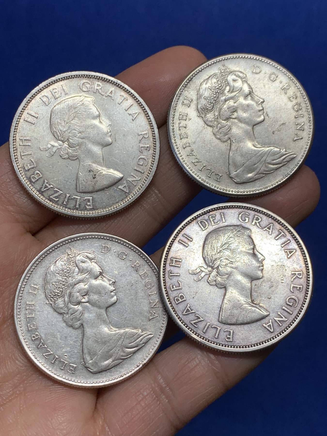 《竞宝斋》第240场-周日，周一 年终尾场 (全场包邮) 4枚一组 加拿大一元银币 每枚重23.3g 800银 状态都不错 带底光