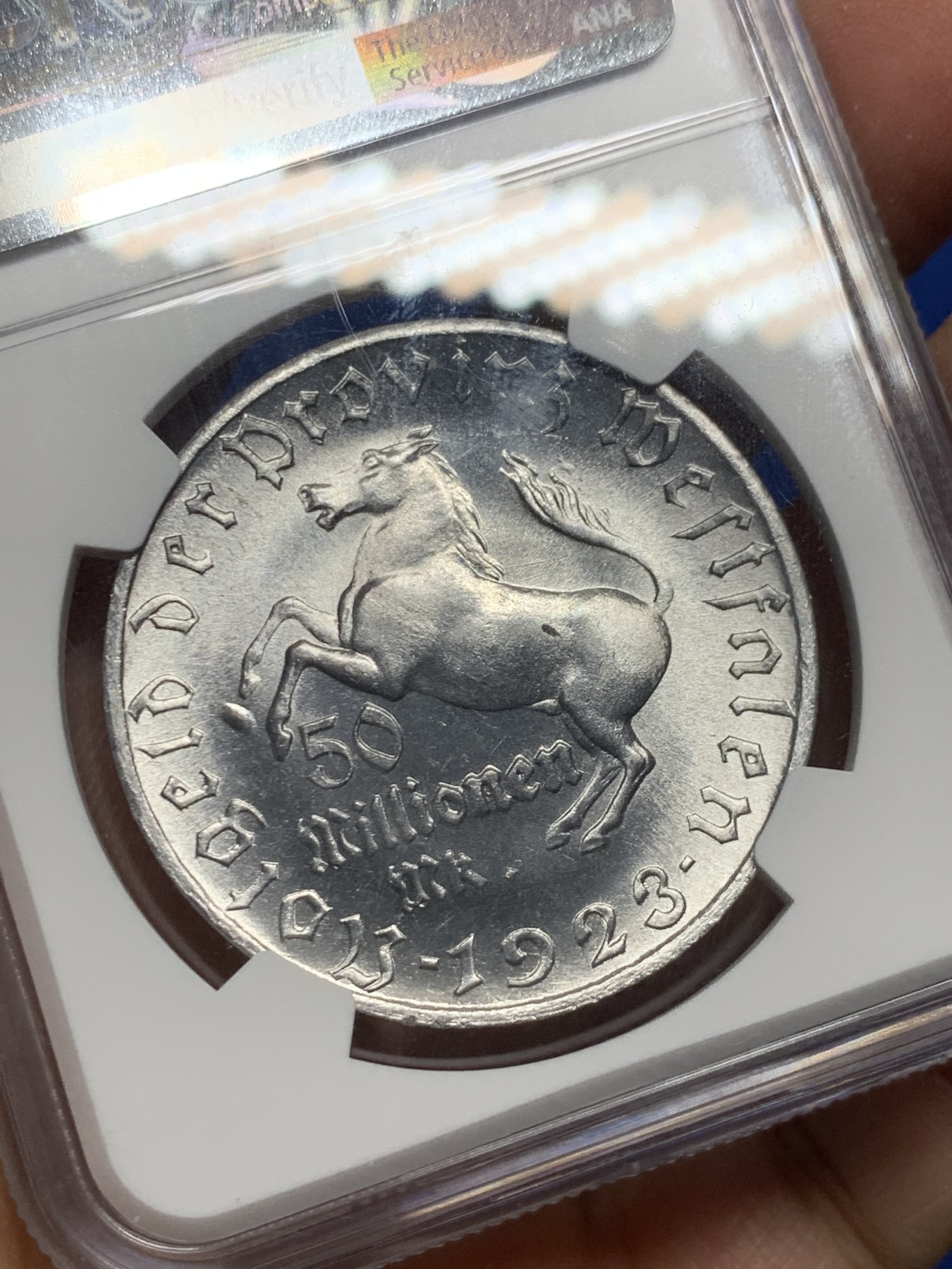 《竞宝斋》第240场-周日，周一 年终尾场 (全场包邮) NGC MS64 德国紧急状态硬币威斯特法伦1923年五千万马克马币，德紧少见品种，超强转光，铸纹清晰，足够自藏