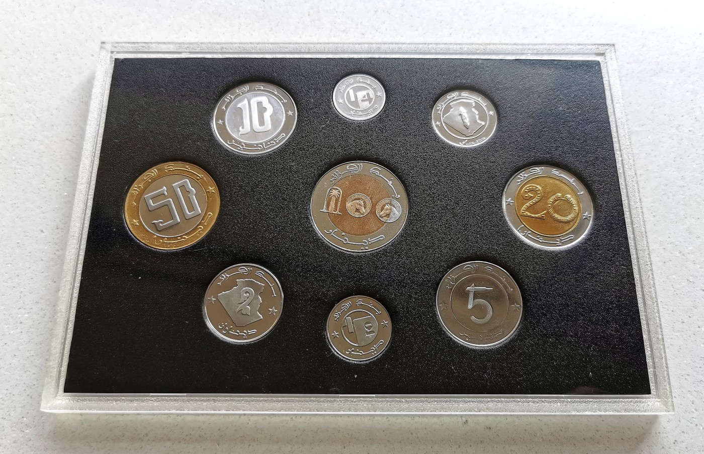 凡希社世界钱币微拍第二百六十期 荐！阿尔及利亚混年版精铸PS九枚原厂塑封附证书，现代PS最顶级稀有的品种之一！